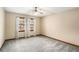 Bright bedroom with ceiling fan and window curtains at 1791 Lake George Dr, Lithia Springs, GA 30122