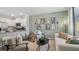 Relaxing living room featuring a neutral color palette and contemporary furniture at 2098 Moss Hill Rd, Stone Mountain, GA 30088