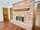 Brick fireplace with wood mantel in living room at 342 Mccurry Rd, Stockbridge, GA 30281