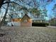 Brick house with front porch and landscaped yard at 342 Mccurry Rd, Stockbridge, GA 30281