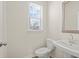 Clean bathroom with white vanity and toilet at 3812 Thatcher Sw Dr, Marietta, GA 30008