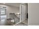 Hallway shows the railing, trim, doorways and lighting at 3812 Thatcher Sw Dr, Marietta, GA 30008