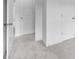 Hallway featuring doors and neutral carpeting at 3812 Thatcher Sw Dr, Marietta, GA 30008
