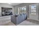 The cozy living room features modern fixtures and a large TV at 3812 Thatcher Sw Dr, Marietta, GA 30008
