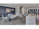 Open concept living space featuring a dining area, kitchen and stairway at 3812 Thatcher Sw Dr, Marietta, GA 30008