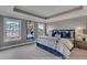 This spacious main bedroom features large windows, tray ceilings, and neutral décor at 3812 Thatcher Sw Dr, Marietta, GA 30008