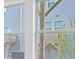 View from a window of a modern home with lots of windows and decks at 3812 Thatcher Sw Dr, Marietta, GA 30008