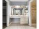 Bathroom with vanity, large mirror, and access to shower at 113 Rue Fontaine # 113, Lithonia, GA 30038
