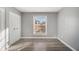 Well-lit bedroom with double doors and wood floors at 113 Rue Fontaine # 113, Lithonia, GA 30038