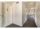 Clean hallway with carpeted floor and doors to units at 113 Rue Fontaine # 113, Lithonia, GA 30038