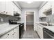 Charming kitchen with stainless steel appliances and plenty of counter space at 113 Rue Fontaine # 113, Lithonia, GA 30038
