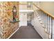 Lobby with carpeted floor, staircase, and floral wallpaper at 113 Rue Fontaine # 113, Lithonia, GA 30038