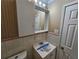 Bathroom with vanity, medicine cabinet and tiled walls at 1613 Gilston Ct, Decatur, GA 30032