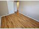 Bedroom with hardwood floors and double door closet at 1613 Gilston Ct, Decatur, GA 30032