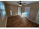 Bright bedroom featuring hardwood floors and ample closet space at 1613 Gilston Ct, Decatur, GA 30032