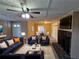 Living room with fireplace, stylish furniture and large TV at 1613 Gilston Ct, Decatur, GA 30032