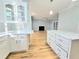 Modern kitchen with white cabinets and marble countertops at 215 Deer Cliff, Lawrenceville, GA 30043