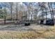 Backyard with fire pit and storage shed at 208 Hickory Rdg, Cumming, GA 30040