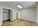 Basement bedroom with closet and wood-look floors at 208 Hickory Rdg, Cumming, GA 30040