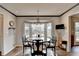 Bright dining area with a bay window and seating for four at 208 Hickory Rdg, Cumming, GA 30040