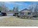 Ranch style home with stone accents and a two-car garage at 208 Hickory Rdg, Cumming, GA 30040