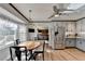 Modern kitchen with stainless steel appliances and breakfast nook at 208 Hickory Rdg, Cumming, GA 30040