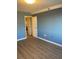 Bedroom with light blue walls and hardwood floors at 2479 Peachtree Ne Rd # 1103, Atlanta, GA 30305