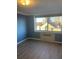 Bedroom with hardwood floors, blue walls and city view at 2479 Peachtree Ne Rd # 1103, Atlanta, GA 30305