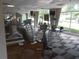 Fitness center with various exercise equipment and large windows at 2479 Peachtree Ne Rd # 1103, Atlanta, GA 30305