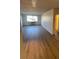 Spacious living room with hardwood floors and large window at 2479 Peachtree Ne Rd # 1103, Atlanta, GA 30305