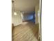 Spacious living room with light wood-look flooring at 2479 Peachtree Ne Rd # 1103, Atlanta, GA 30305