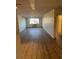 Spacious living room with hardwood floors and large window at 2479 Peachtree Ne Rd # 1103, Atlanta, GA 30305