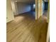 Spacious living room with light wood-look flooring at 2479 Peachtree Ne Rd # 1103, Atlanta, GA 30305