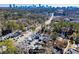 Aerial view showcasing home's location and city skyline at 4196 Roswell Rd Ne, Atlanta, GA 30342