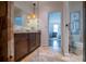 Large bathroom with double vanity, walk-in shower, and elegant tile at 4196 Roswell Rd Ne, Atlanta, GA 30342