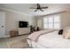 Relaxing bedroom with a comfortable bed, TV, and stylish rug at 4196 Roswell Rd Ne, Atlanta, GA 30342