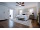 Spacious main bedroom with hardwood floors and a cozy sitting area at 4196 Roswell Rd Ne, Atlanta, GA 30342