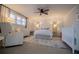 Bright Bedroom features a crib, dresser, and comfy seating at 4196 Roswell Rd Ne, Atlanta, GA 30342