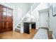 Two-story entryway with hardwood floors and staircase at 4196 Roswell Rd Ne, Atlanta, GA 30342