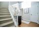 Entryway with hardwood floors, staircase, and console table at 4196 Roswell Rd Ne, Atlanta, GA 30342