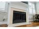 Elegant fireplace with a marble surround and a modern design at 4196 Roswell Rd Ne, Atlanta, GA 30342