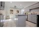 Updated kitchen featuring gray cabinets, white tile, and an island at 4196 Roswell Rd Ne, Atlanta, GA 30342