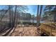 Backyard with a wooden deck overlooking a pond at 5674 Wylmoor, Norcross, GA 30093