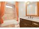 Bathroom with shower/tub combo and updated vanity at 745 Glengate Pl, Atlanta, GA 30328