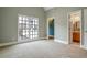 Bright bedroom with large windows and en-suite bathroom at 745 Glengate Pl, Atlanta, GA 30328