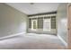 Bedroom with built-in shelving and window seat at 745 Glengate Pl, Atlanta, GA 30328