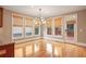 Breakfast room with hardwood floors, built-in shelving, and access to deck at 745 Glengate Pl, Atlanta, GA 30328