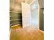 Wire shelving closet with open door to bedroom at 745 Glengate Pl, Atlanta, GA 30328