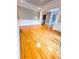 Bright dining room features hardwood floors and wainscoting at 745 Glengate Pl, Atlanta, GA 30328