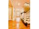 Two-story entryway with hardwood floors and staircase at 745 Glengate Pl, Atlanta, GA 30328